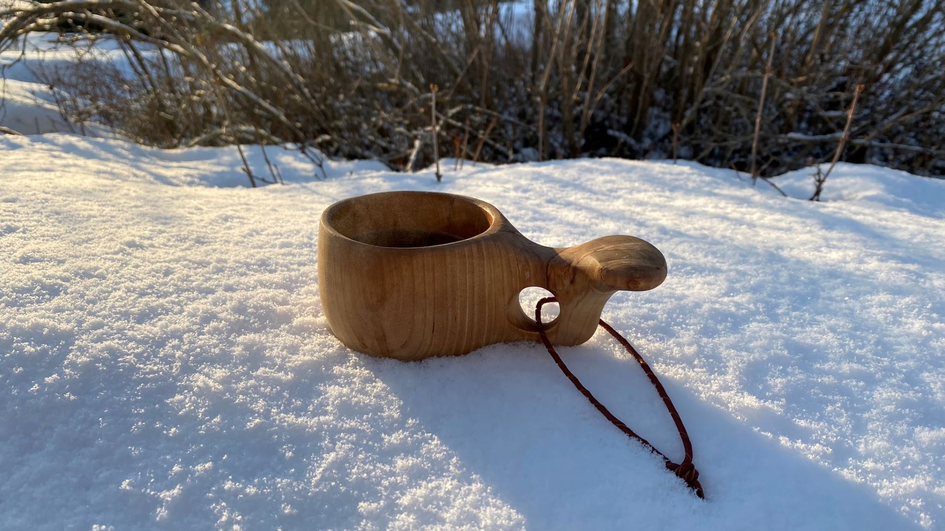 https://www.outinthenature.com/wp-content/uploads/2022/03/Finnish-kuksa-wooden-cup.jpeg